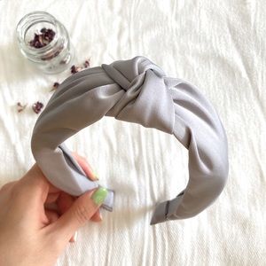 Knot headband in silky gray